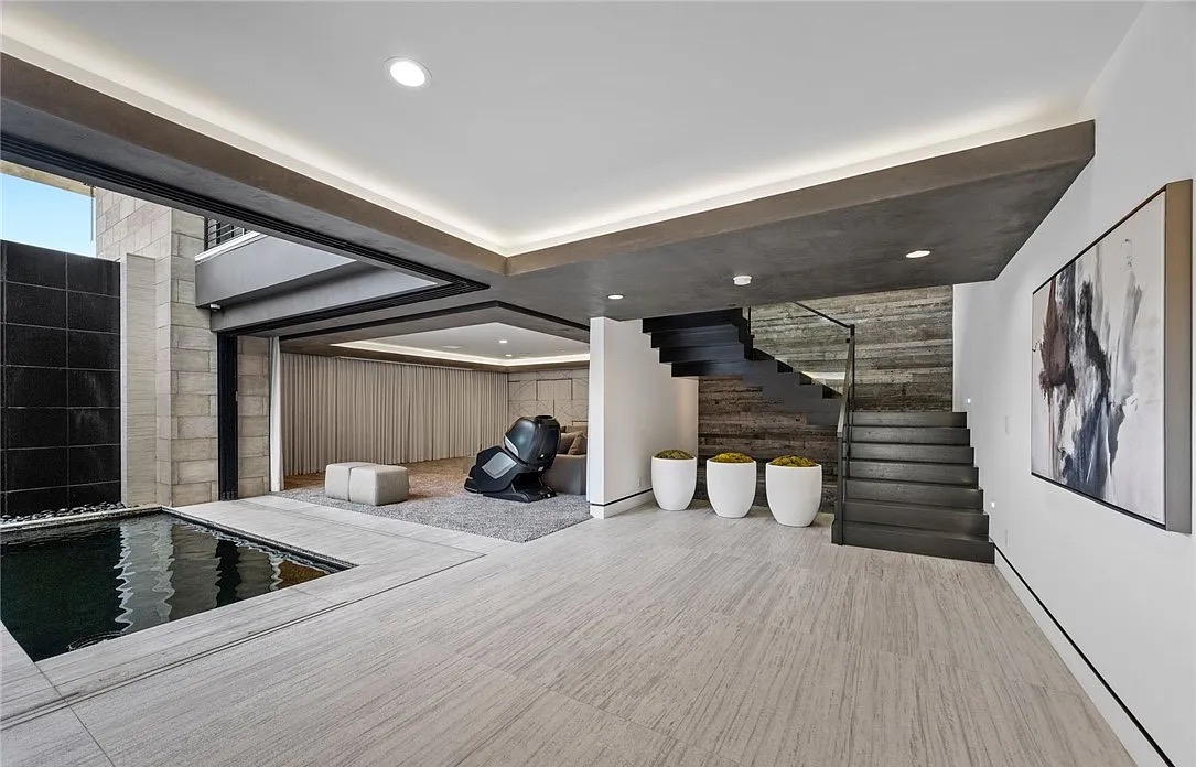Modern estate exterior with pool