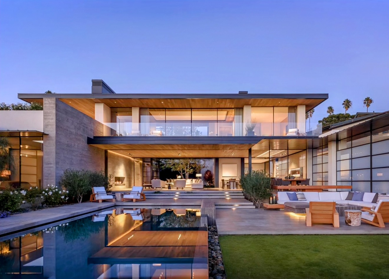 Modern Paradise Valley home with pool at dusk
